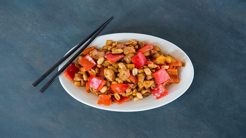 Kung Pao Chicken · Dark meat chicken with red bell peppers, peanuts and water chestnuts in a spicy red sauce. Hot and spicy.