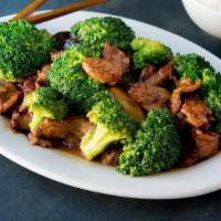 Beef And Broccoli · Flank steak, broccoli and black mushrooms sauteed in a garlic brown sauce.