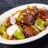 Pepper Steak · Flank steak, green bell peppers, onions and garlic in a black pepper sauce. Hot and spicy.
