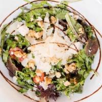 Walnut & Gorgonzola Salad · Seasonal greens, grape tomatoes, walnuts, Gorgonzola, Parmigiano-Reggiano, walnut and gorgon...