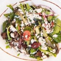 Greek Salad · Baby spinach, seasonal greens, grape tomatoes, feta, kalamata olives, red onions, Italian vi...