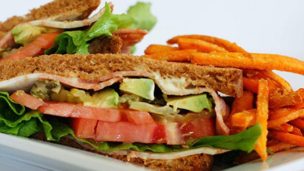 Avocado Blt Sandwich Specialty · Vegan strips, lettuce, tomato, avocado, house sauce, and pickles on toasted wheat bread.