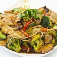 Drunken Noodle · Spicy. Stir-fried flat rice noodles, mixed vegetables, bean sprouts, soy protein slices, tof...