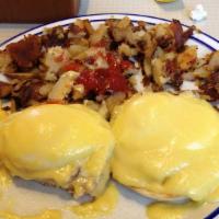 Eggs Benedict · Canadian bacon and poached eggs served over an English muffin, topped with delicious holland...