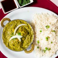 Saag Paneer · Seasoned pureed spinach leaves cooked with indian cheese and spices.