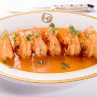 Cajun Shrimp · Colossal shrimp sautéed in Cajun cream sauce.