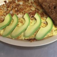 Ca Omelette · Grilled bell pepper and cheese topped with avocado. Served with hash browns and toast.