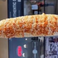 Corn/Elote · On the cob served with mayonnaise, cream, cotija cheese, chili powder