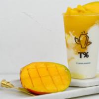 Mango Smoothie · Mango  smoothie made w/fresh mango mixed w/yogurt and topped with mango  bites.