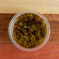 Chimichurri · Vegetarian, vegan. Organic. Made with fresh parsley, garlic, oregano and chili peppers mixed...