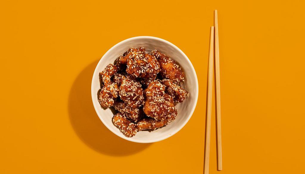 Sesame Chicken · Lightly fried chicken with sweet spicy sauce and sesame seeds.
