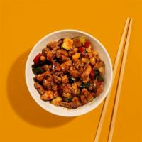 Spicy Kung Pao Chicken · Spicy stir-fried chicken with peanuts, scallions, and chili sweet red mandarin sauce