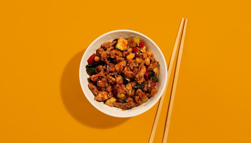 Spicy Kung Pao Chicken · Spicy stir-fried chicken with peanuts, vegetables, and chili.