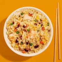 Young Chow Fried Rice · Classic young chow fried rice with shrimp and bbq pork.