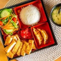 Chicken Katsu · Served with miso soup, green salad, steamed rice, gyoza and 6 pcs of California roll.
