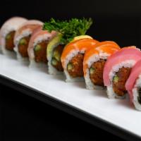 Rainbow Roll · IN: crab meat, avocado
OUT: tuna, salmon, albacore, yellowtail, avocado