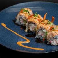 Baked Salmon · IN: crab meat, avocado
OUT: baked salmon, masago, green onion, eel sauce, spicy mayo