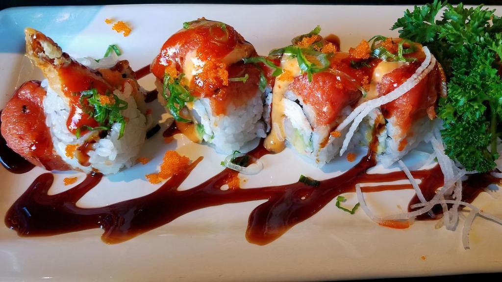 Cherry Blossom (Spicy) · IN: shrimp tempura, crab meat, avocado
OUT: spicy tuna, green onion, masago, eel sauce, spicy mayo, hot sauce