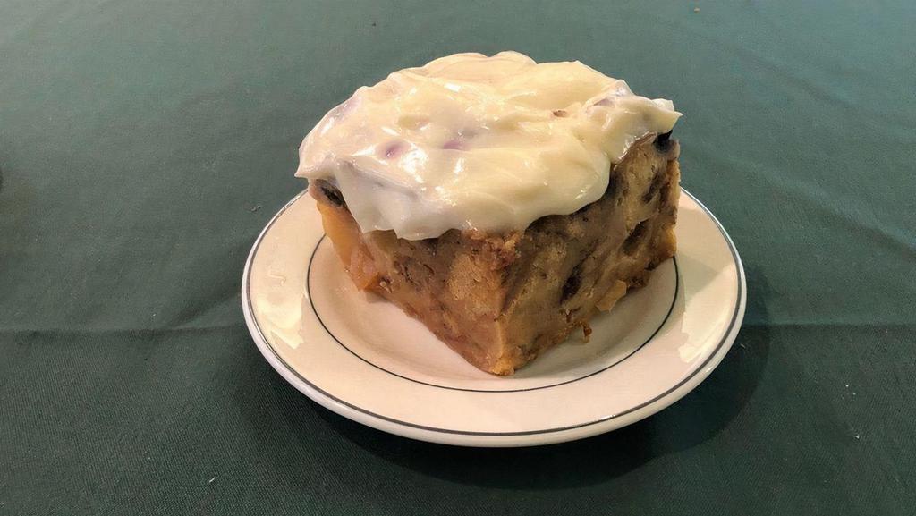 Apple Blueberry Bread Pudding · With jack Daniel's whiskey sauce.