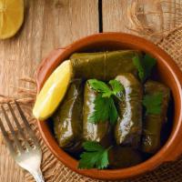 Grape Leaves · 5 grapes leaves stuffed with rice, tomato, onions, parsley and fresh lemon juice.