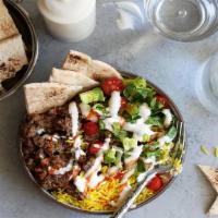 Gyro Plate · Beef and lamb ground together and served with tzaziki sauce, hummus, salad, rice and pita br...