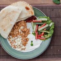 Chicken Shawarma Plate · Rice, hummus,salad, pita bread and tahini sauce.