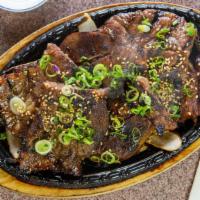 Kalbi · Korean BBQ short ribs marinated with special sauce.