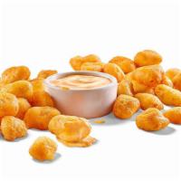 Cheddar Cheese Curds (Large)
 · Wisconsin white cheddar cheese curds /
battered / southwestern ranch