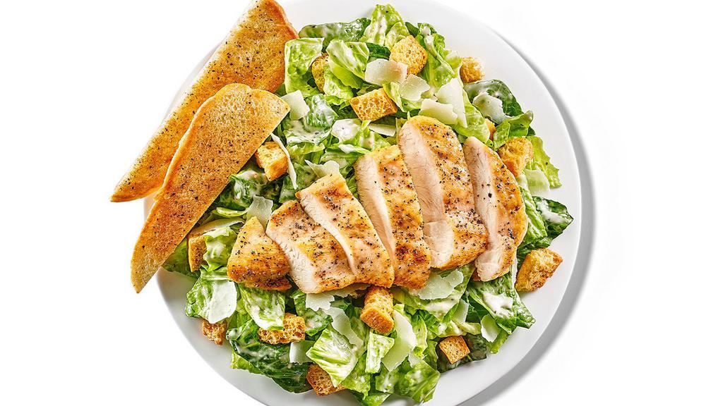 Chicken Caesar Salad · grilled chicken / romaine / Parmesan garlic / Caesar dressing / shaved Parmesan / lemon pepper seasoning / croutons.