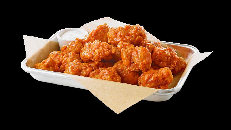 Boneless Wings (15 Pieces) · Tender all-white chicken, lightly breaded and cooked to a golden crisp. Handspun in your favorite sauce or dry seasoning.