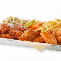 Traditional & Boneless Wings Combo · Tender all-white chicken, lightly breaded and cooked to a golden crisp. Handspun in your fav...