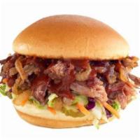 Smoked Brisket Sandwich · smoked pulled brisket / sweet  BBQ / grilled onions / pickles / slaw / challah bun / natural...
