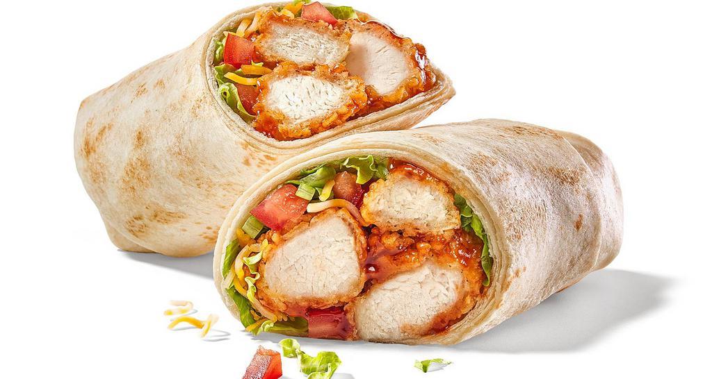 Classic Chicken Wrap · hand-breaded or pulled chicken / choice of sauce or dry seasoning / cheddar-jack cheese / shredded iceberg lettuce / tomatoes / flour tortilla / house-made tortilla chips & salsa