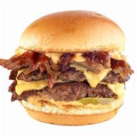 Smoked Brisket Burger · 1020 cal. double patty / hand-smashed / American cheese / smoked pulled brisket / sweet bbq ...