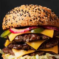 Triple Cheeseburger · Rich Brioche Bun, 3 Delicious Premium Quality Beef Patties, Secret House Sauce, American Che...