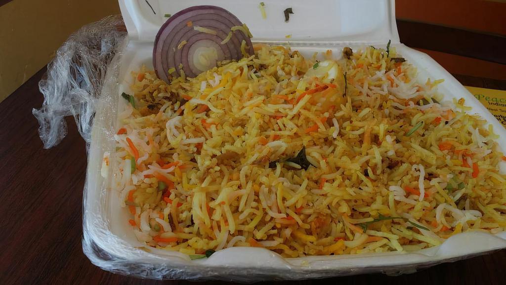 Goat Biryani Lunch · Goat meat cooked with basmati rice and spices.