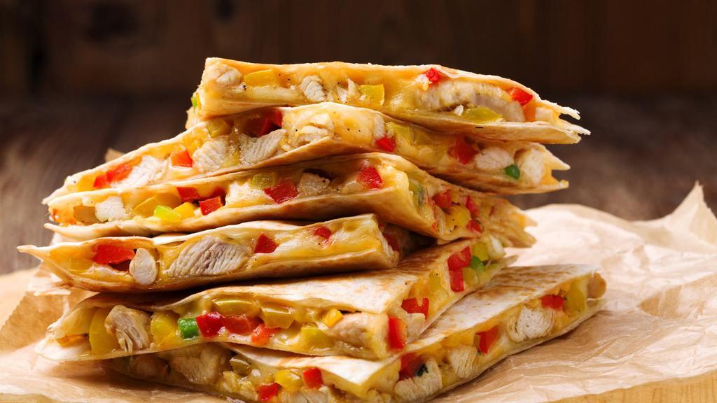 Chicken Quesadilla · Classic Chicken Quesadilla with red sauce and cheese. Includes guacamole and sour cream.