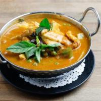 Red Curry · Red curry paste with bamboo shoots, Thai eggplants, basil, lime leaves and green bell pepper...