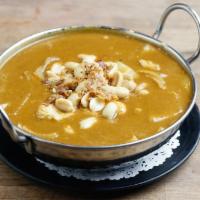 Massamun Curry · Massaman curry paste with potato, carrot, onion in mild spicy coconut milk and roasted peanut