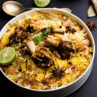 Lamb Biryani · Delicious rice with american lamb, nuts, saffron, herbs, and vegetables.