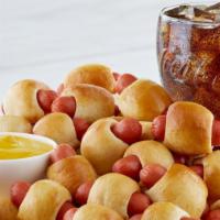 Mini Pretzel Dogs Combo · Combos include a regular drink and your choice of sauce.