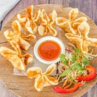 Crab Rangoon (8 Pieces) · Fried wonton sheets stuffed with cream cheese, imitation crab meat, onions and carrots.