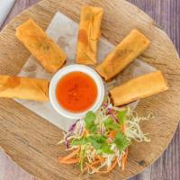 Crispy Rolls (6 Pieces) · Deep fried spring rolls stuffed with vegetables. Served with a sweet and sour sauce.