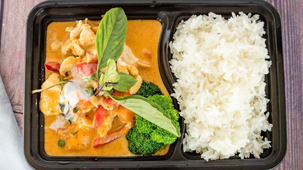 Panang Curry · Simmered in rich red panang curry paste in coconut milk bell peppers, zucchini, basil leaves.