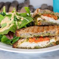 Chicken Pesto · Grilled free range chicken breast served on rustic buckwheat with goat cheese, roasted tomat...