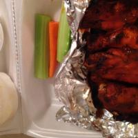 Buffalo Wings · One pound of wings marinated in spices. Served with carrots and ranch, or a dressing of your...