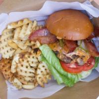 Smash Burger & Fries (Vegan Option) · 1/3lb ABF & hormone free beef smashed to perfection, lettuce, onion, pickles, tomato, specia...