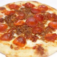 Carnivore Pizza · Free range bolognese, nitrate free sausage & pepperoni, mozzarella, organic pizza sauce