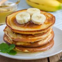 Banana Buttermilk Pancakes · Delicious and fluffy buttermilk pancakes with fresh bananas.
