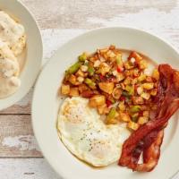 Granny'S Biscuits And Homemade Country Gravy · 2 biscuits smothered in creamy sausage bacon country gravy served with 2 eggs, bacon sausage...
